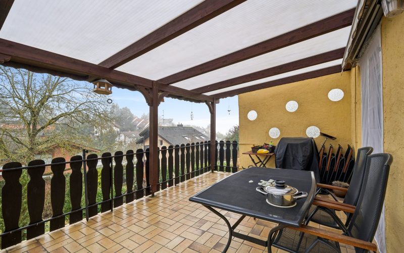 Überdachter Balkon